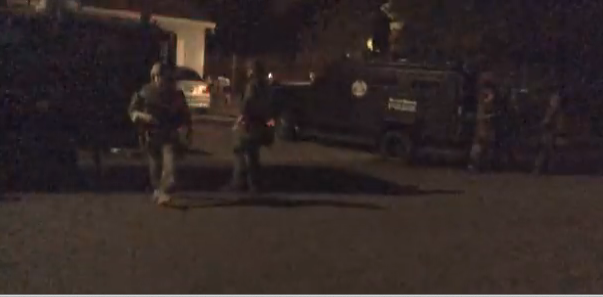 Domestic Terrorist Arrested For Filming Militarized Swat Raid.