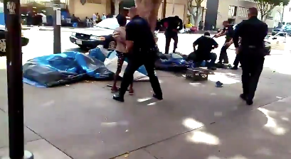 Graphic Video Shows LA Cop Shooting And Killing Unarmed Homeless Man