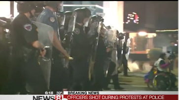 **Alert** All Out War In Ferguson As Two Cops Shot at Protest