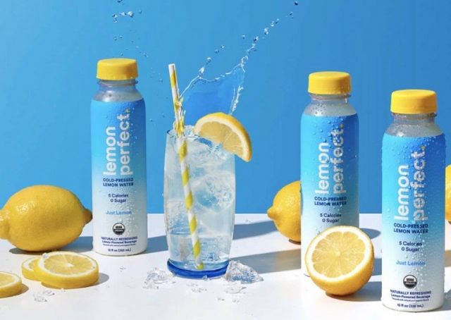 Lemon Perfect product image with blue bottles and a lemon in the middle