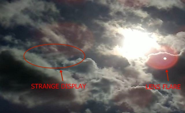 Strange Matrix-Like Display of Sun and Clouds in the Sky (Video)